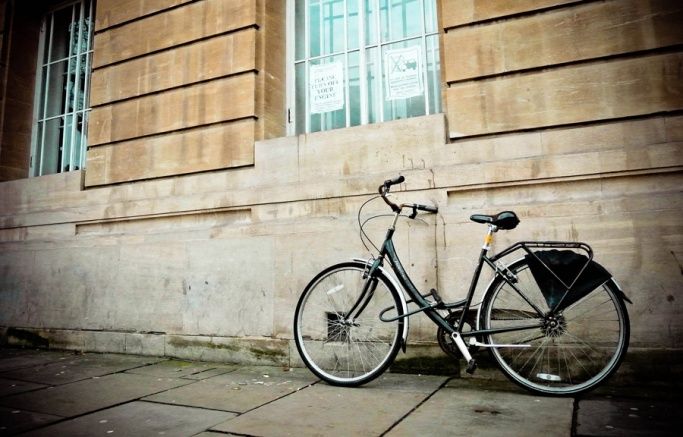 Bike resting against a university building