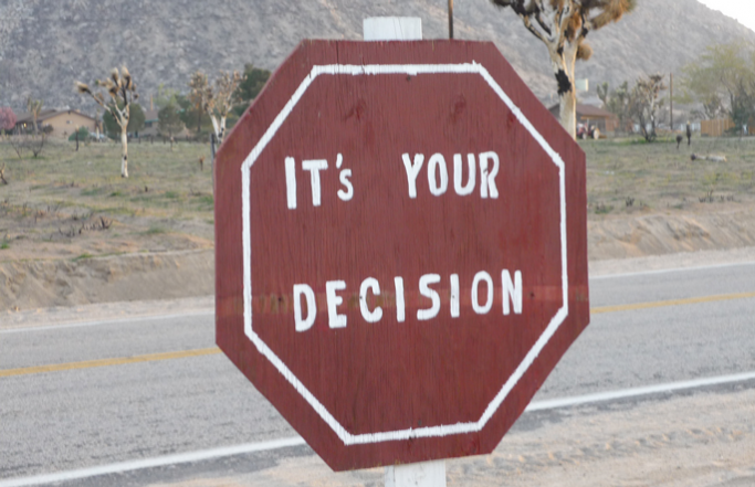 Sign saying "It's your decision"