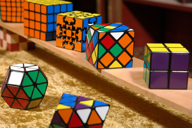 A set of Rubix cubes in different shapes and sizes